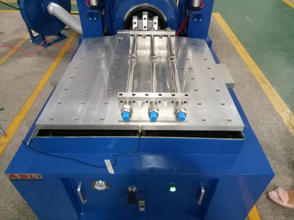 Three Directions Free Vibration High Frequency Vibration Tester – side view showing trunnion isolation and support structure